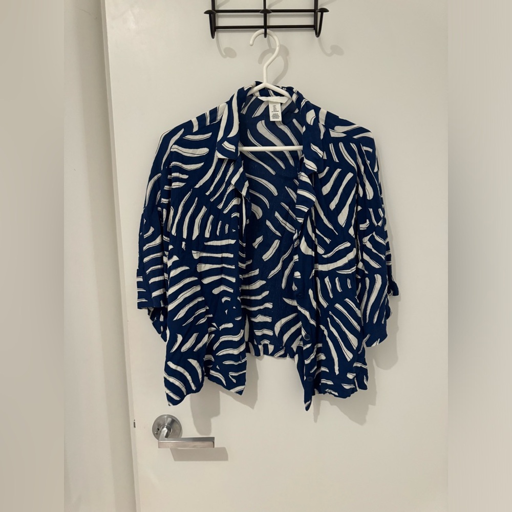 28. H&M Button Up Tee